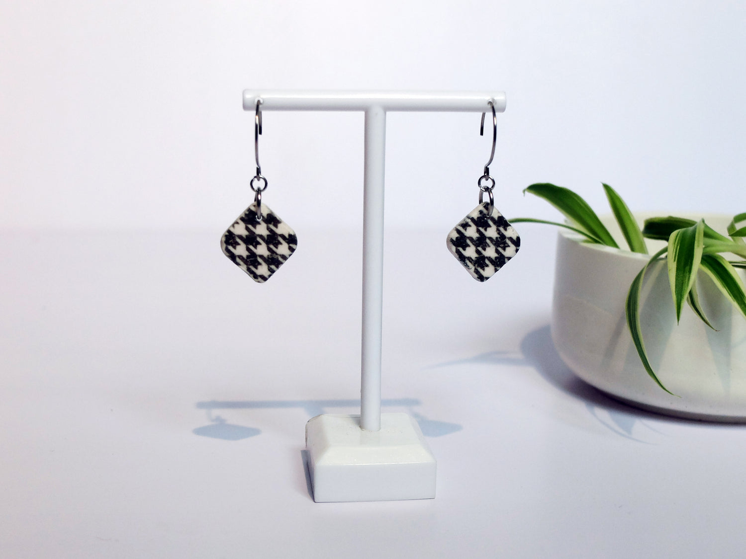 Close up of houndstooth pattern polymer clay dangles - classic transfer design - Polly Plant