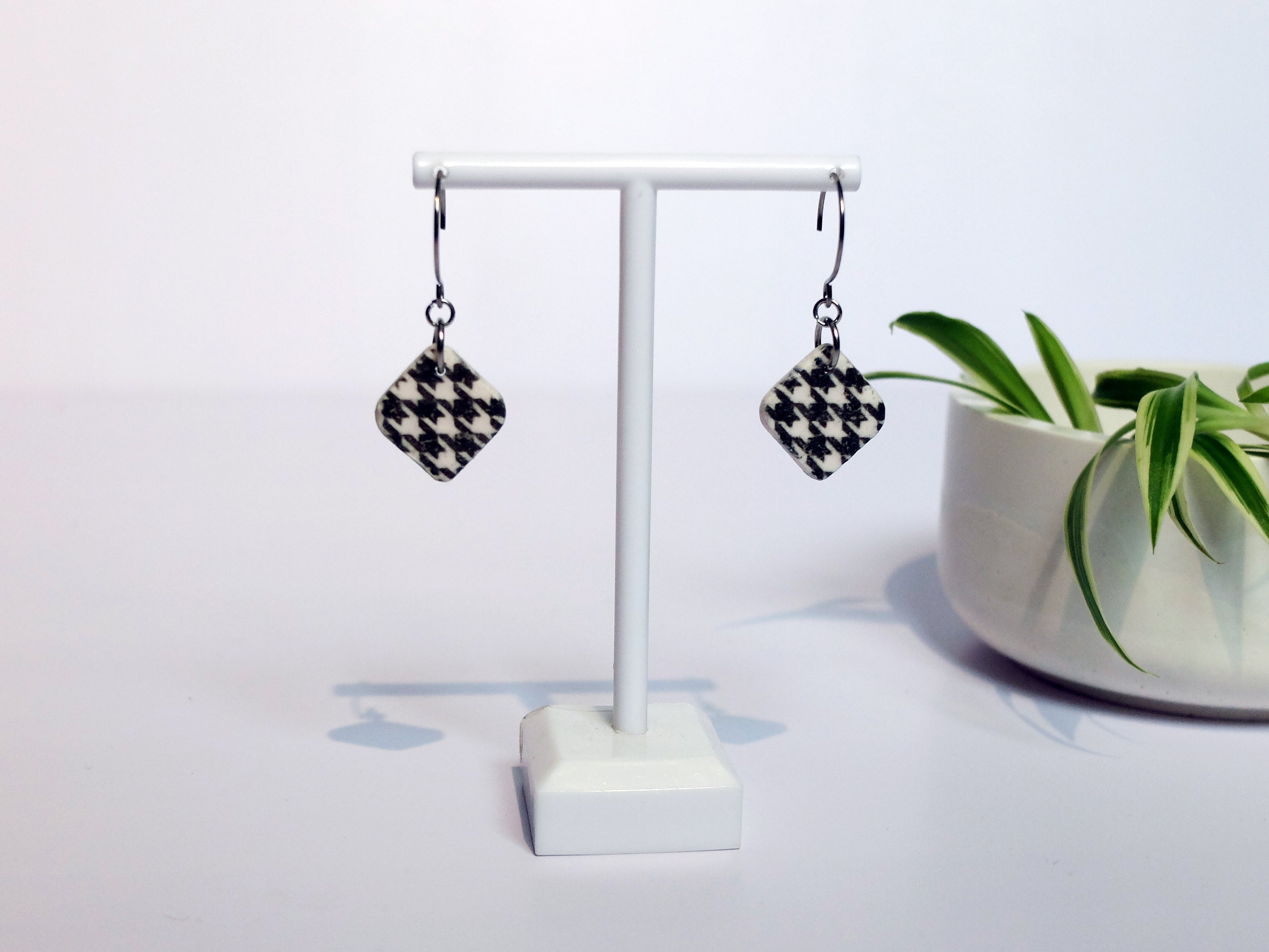Close up of houndstooth pattern polymer clay dangles - classic transfer design - Polly Plant